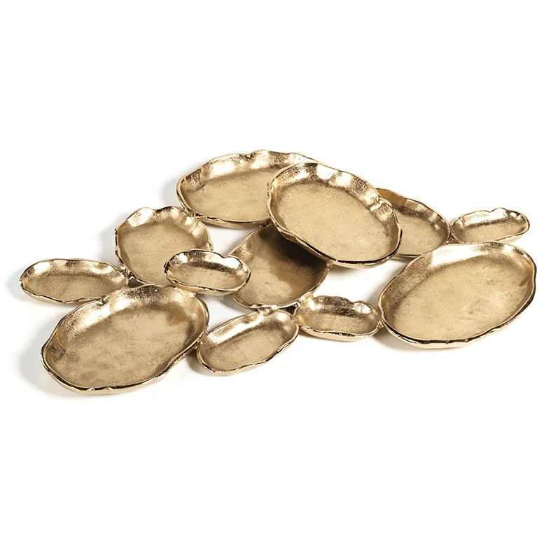 Cluster of Twelve Oval Serving Bowls, Gold